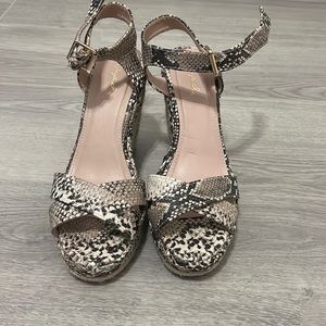 Snakeskin print heels